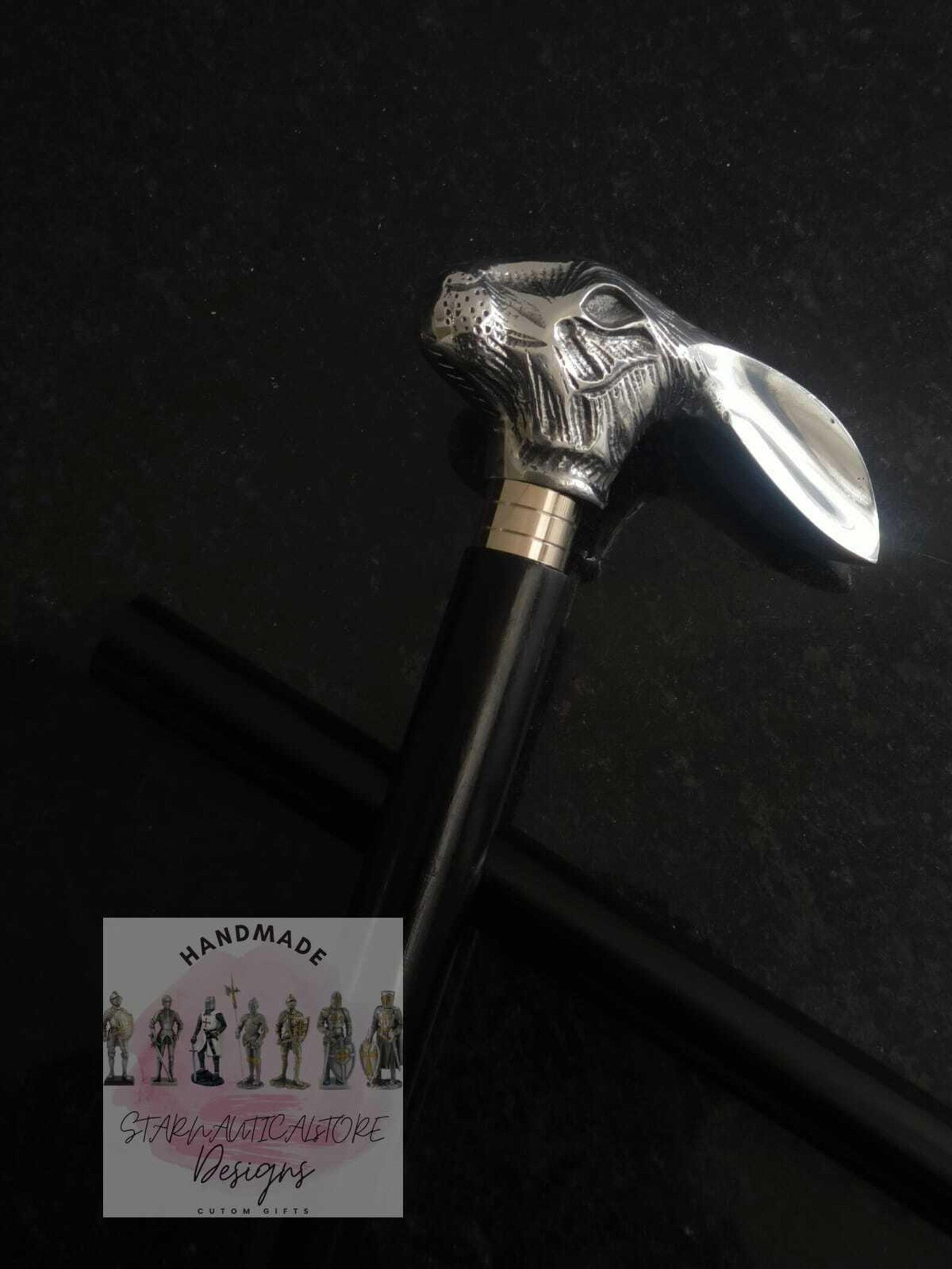 A handcrafted Playboy wooden walking cane featuring a hand-carved rabbit head with Aluminum fittings, perfect as a unique gift.