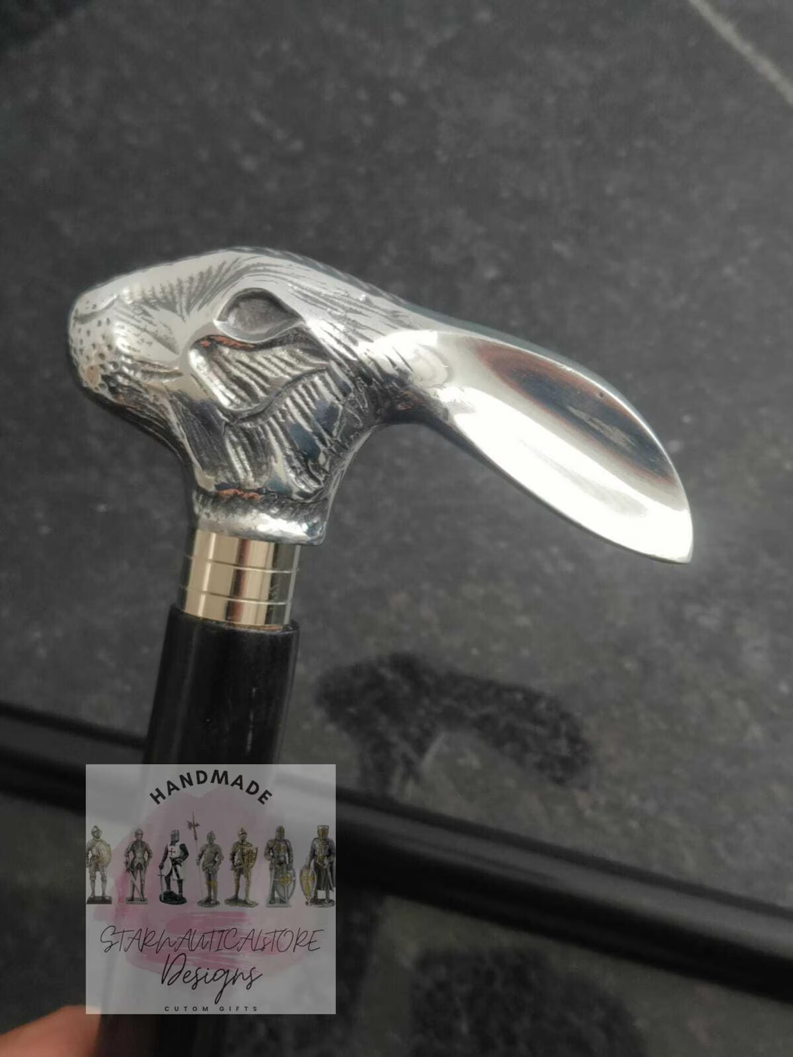 A handcrafted Playboy wooden walking cane featuring a hand-carved rabbit head with Aluminum fittings, perfect as a unique gift.